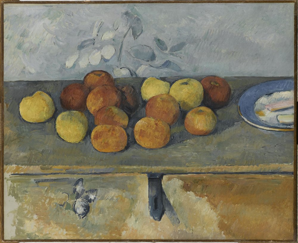 Un tableau de Paul Cezanne représentant des pommes colorées sur une table